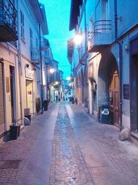 Alley in city at night