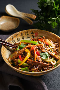 Close-up of noodles in bowl on table