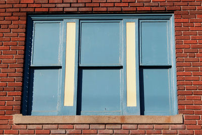 Low angle view of building window