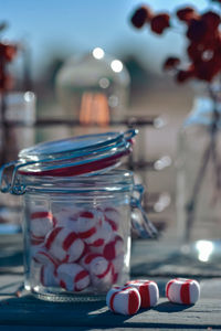 Vintage style handmade red and white striped old fashioned mint candy in jar