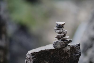 Close-up of stone stack on rock