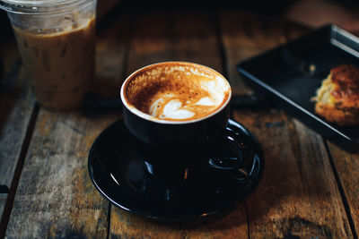 Close-up of coffee cup on table