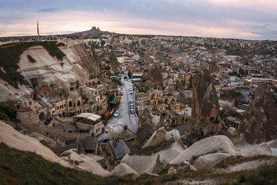 High angle view of buildings in city against sky