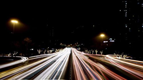 Light trails on road at night