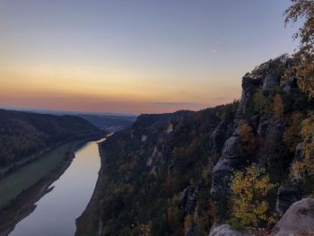 Scenic view of mountains against sky during sunset