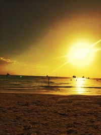 Scenic view of sea at sunset