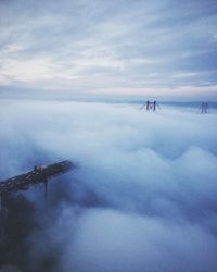 High angle view of bridge amidst cloudscape