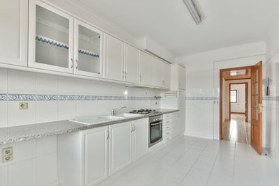 Interior of modern white kitchen