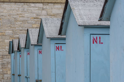 Low angle view of text on house