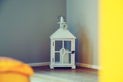 Close-up of electric lamp at home