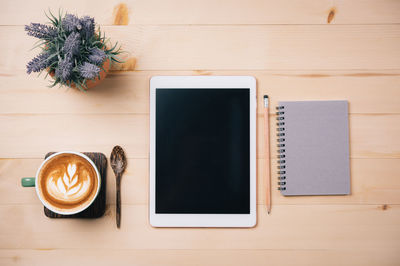 High angle view of coffee cup on table