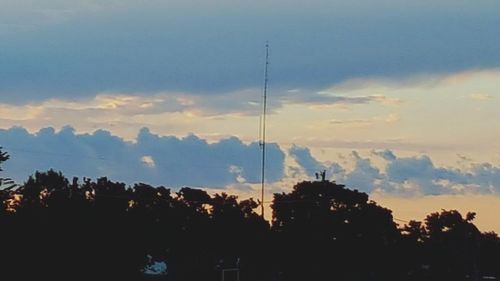 Scenic view of landscape against cloudy sky