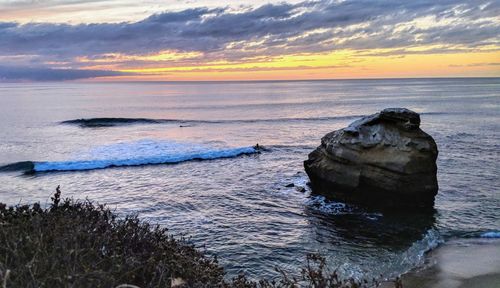 Scenic view of sea against sky during sunset