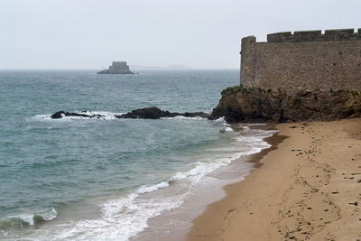 Scenic view of sea against clear sky