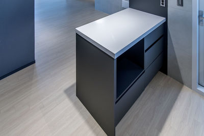 High angle view of white table on floor at home