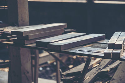 Close-up of empty bench on table