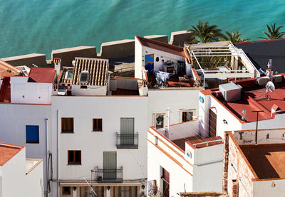 High angle view of swimming pool by sea against sky