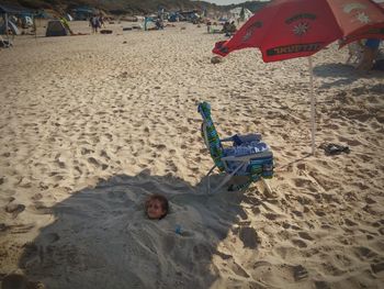 Shadow of people on beach