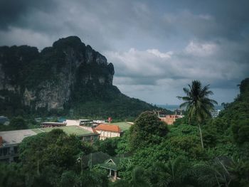 Scenic view of mountain against cloudy sky