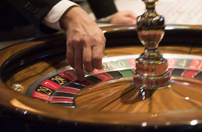 Close-up of hands playing piano