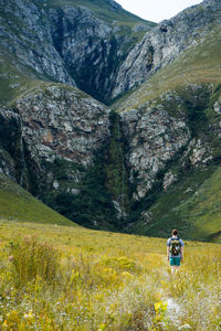 People walking on mountain road