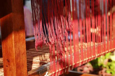 Close-up of red clothes drying