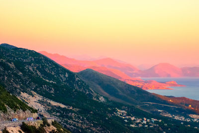 Scenic view of mountains against sky during sunset