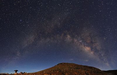 Scenic view of star field against sky at night