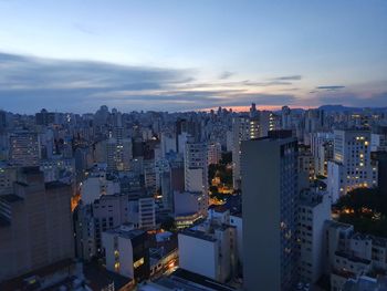 São paulo high angle view of illuminated buildings against sky at sunset