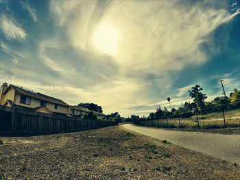 Road against cloudy sky