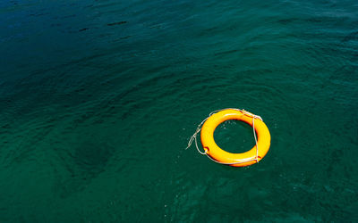 High angle view of yellow floating on water