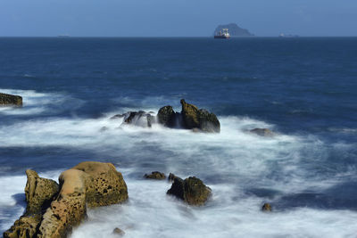 Scenic view of sea against clear sky