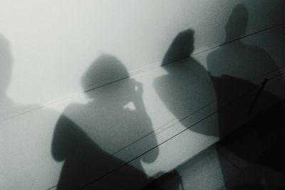 Shadow of man on wall