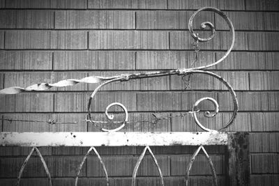 Close-up of bicycle against wall