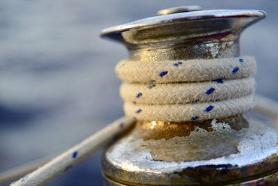 Close-up of rope tied to metal