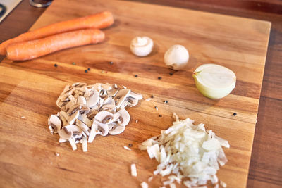 High angle view of chopped bread on cutting board