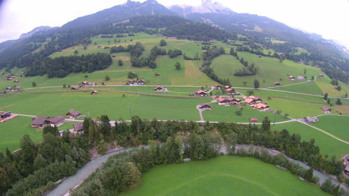 High angle view of trees on landscape against sky