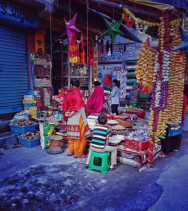 built structure, architecture, building exterior, hanging, large group of objects, wall - building feature, abundance, religion, no people, illuminated, multi colored, outdoors, house, place of worship, old, variation, day, spirituality, lantern