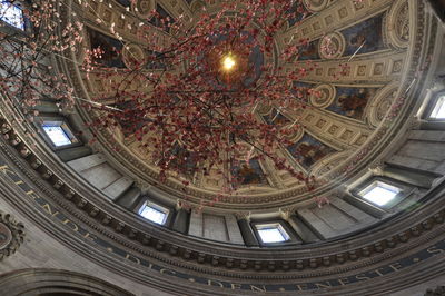 Low angle view of illuminated ceiling of building