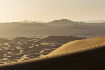 Scenic view of desert against sky