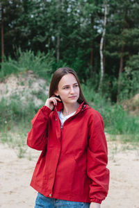 Candid portrait of a young caucasian woman at the beach