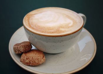 Close-up of cappuccino on table