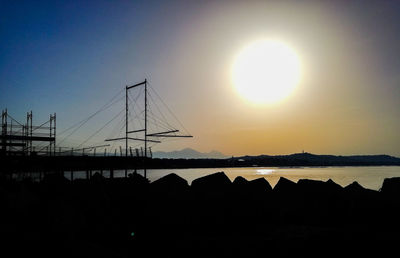 Scenic view of sea against clear sky during sunset