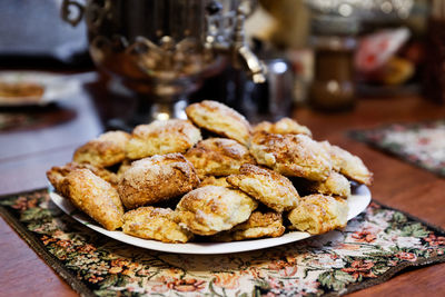 Close-up of cookies in plate on table