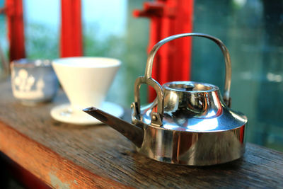 Close-up of tea cup on table at home