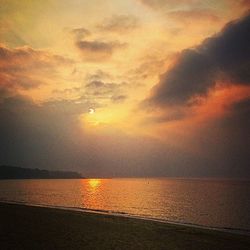 Scenic view of sea at sunset