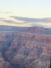 Scenic view of dramatic landscape during sunset