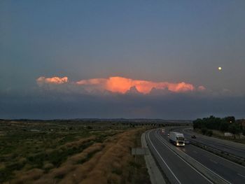 Scenic view of road against sky during sunset