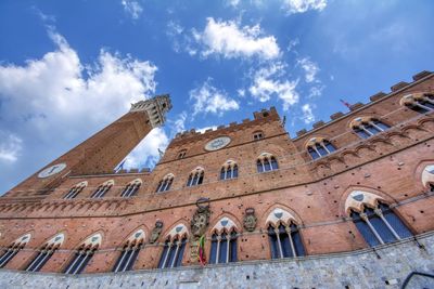 Low angle view of old building against sky