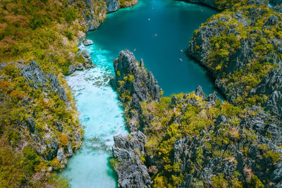 High angle view of rocks in sea